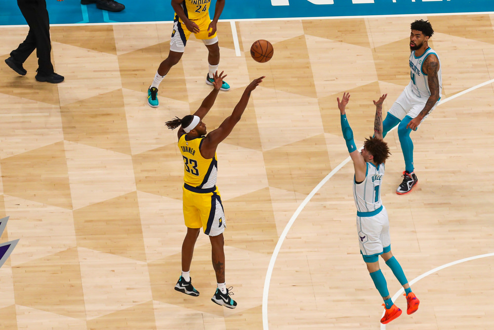 Myles Turner shooting over LaMelo Ball